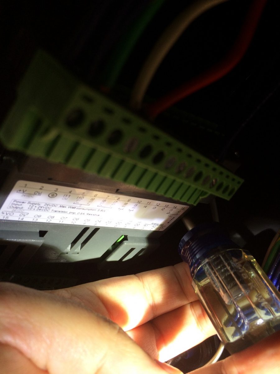 The inside clip is invisible from the front. Go by feel. I found the shorty philips screwdriver worked best, with the other hand holding the clip.